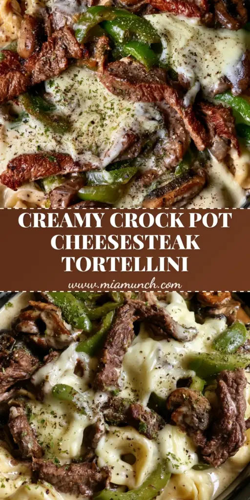A close-up shot of Crock Pot Cheesesteak Tortellini in a black slow cooker with melted cheese and green peppers.
